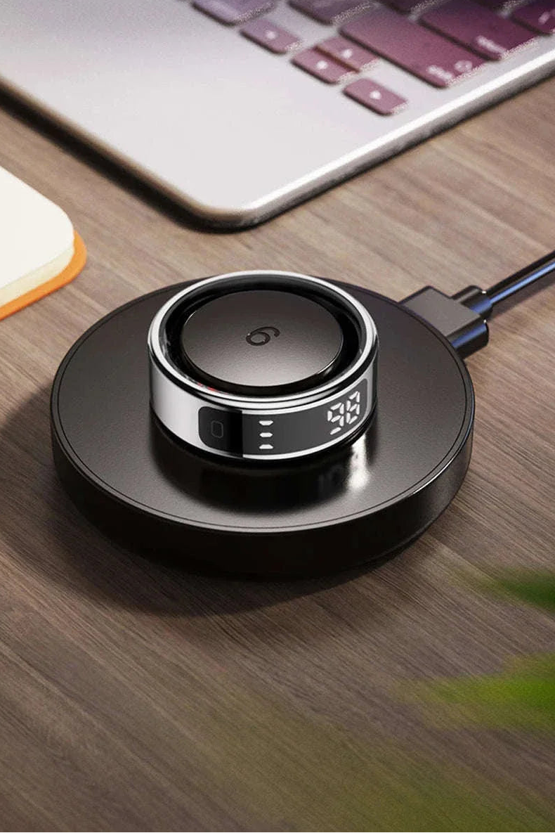 Zesvra smart ring device on a charging stand